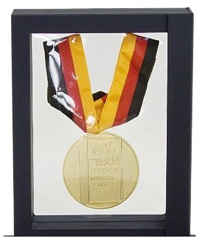 Floating frame packaging for medals